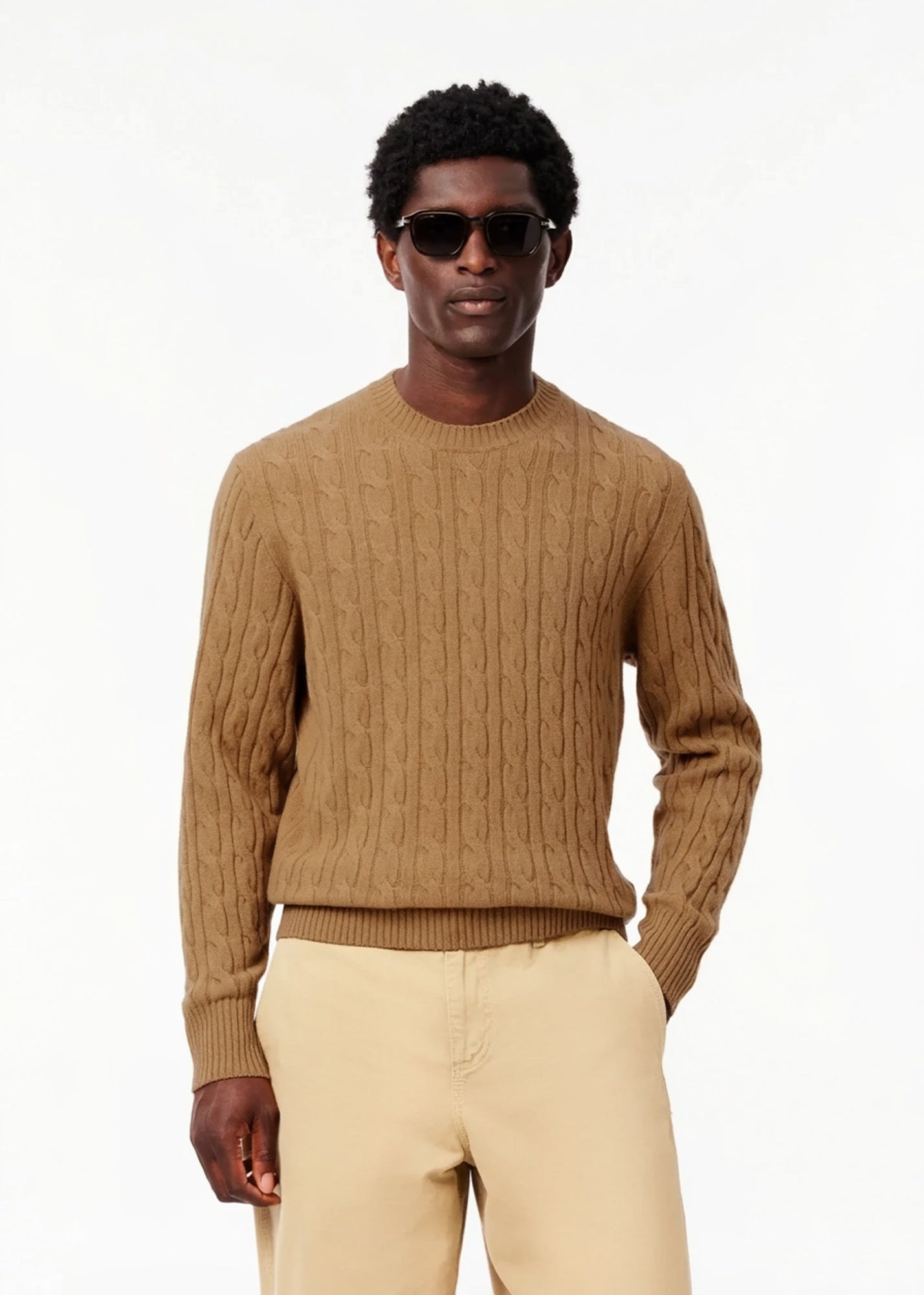 Pull torsadé beige en laine